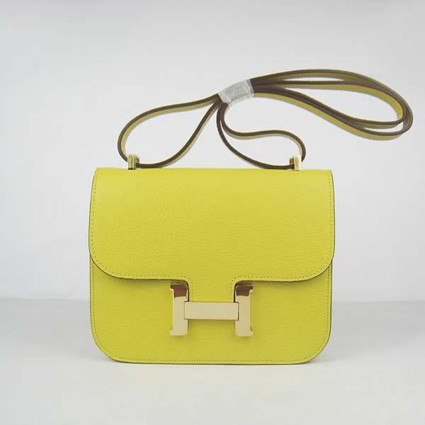 Replica Hermes Constance High Quality H107 Cow Leather Yellow Ladies Cross Body Bag with wholesale price from China.